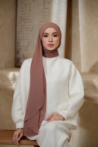NAURA ROSE BROWN