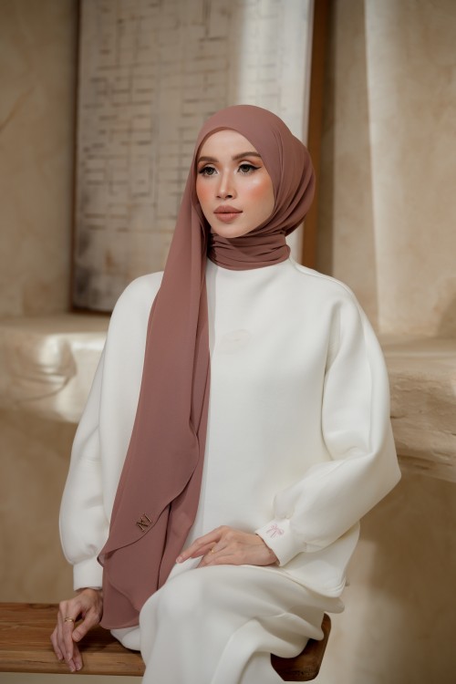 NAURA ROSE BROWN